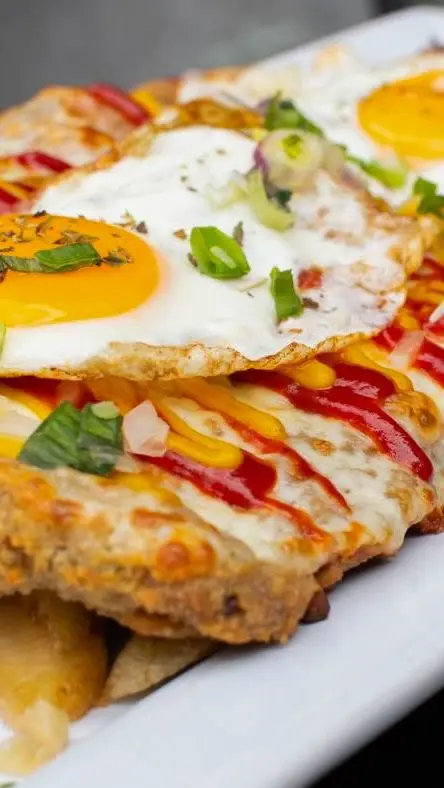 Milanesa a caballo con huevos fritos de Sandoval, Caballito